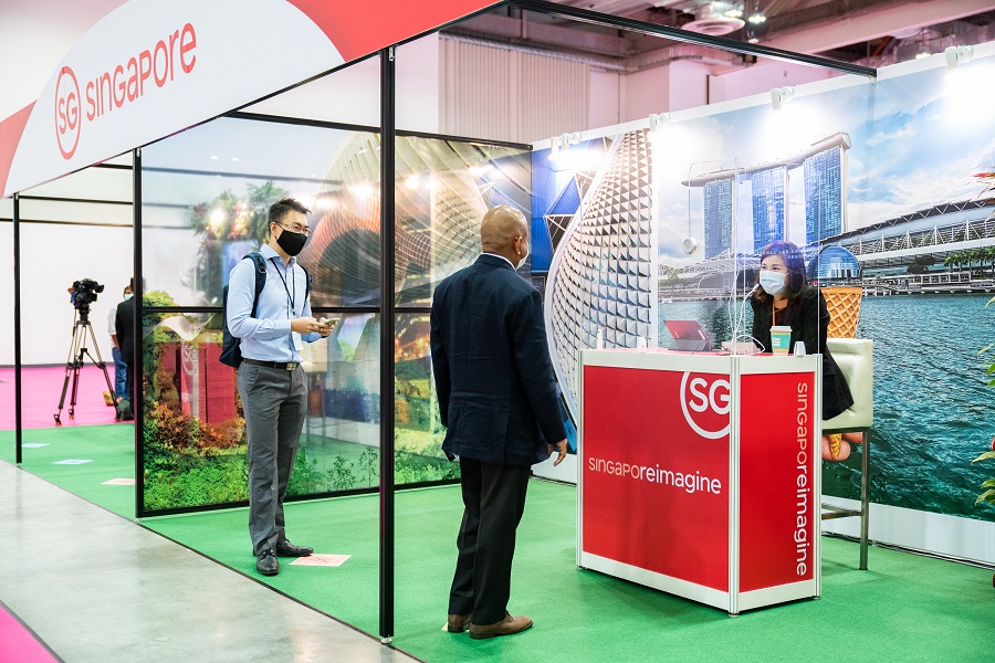 guests at the Singapore Reimagine booth at TravelRevive Exhibition