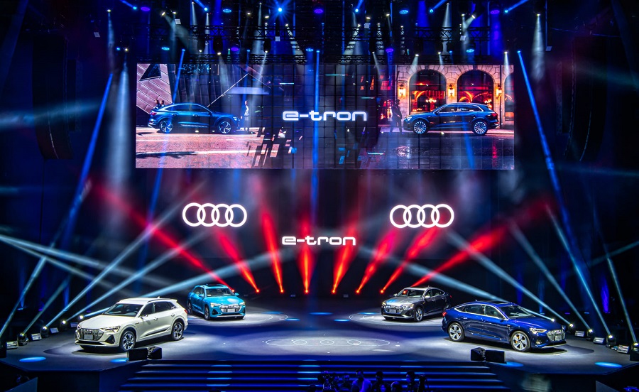 Red laser beams, e-tron logo and Audi e-tron car display at the Audi e-tron Launch Event